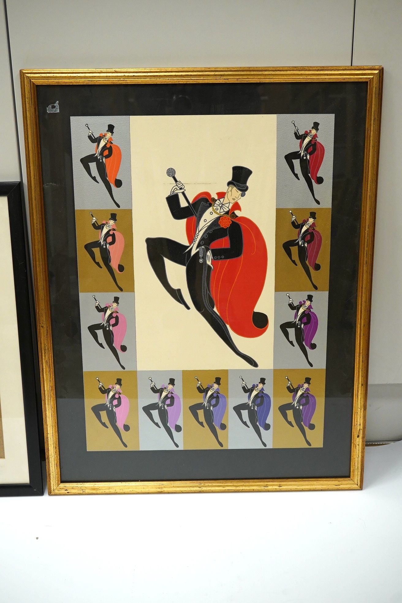 After Romain de Tirtoff (Erté, 1892-1990), two colour prints, Art Deco female with leopard and dancing figure, largest 53 x 39cm. Condition - fair, one loose within the frame